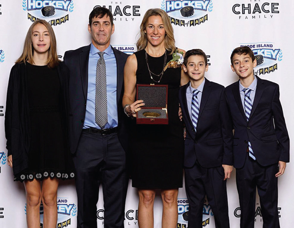 HALL OF FAMER: Sara DeCosta-Hayes and her family are during a previous Rhode Island Hockey Hall of Fame induction ceremony. This year’s event has been postponed.
