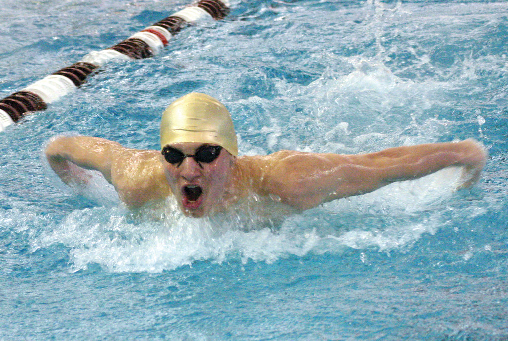 ROUGH WATERS: Hendricken’s Marc Andrews swims the 100 butterfly at Sunday’s state meet. Smithfield stopped Hendricken’s 24-year state championship streak.
