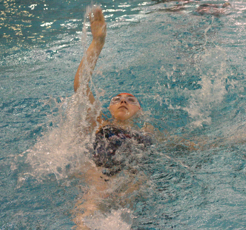 Toll Gate’s Megan Wilks does the backstroke in the medley relay.