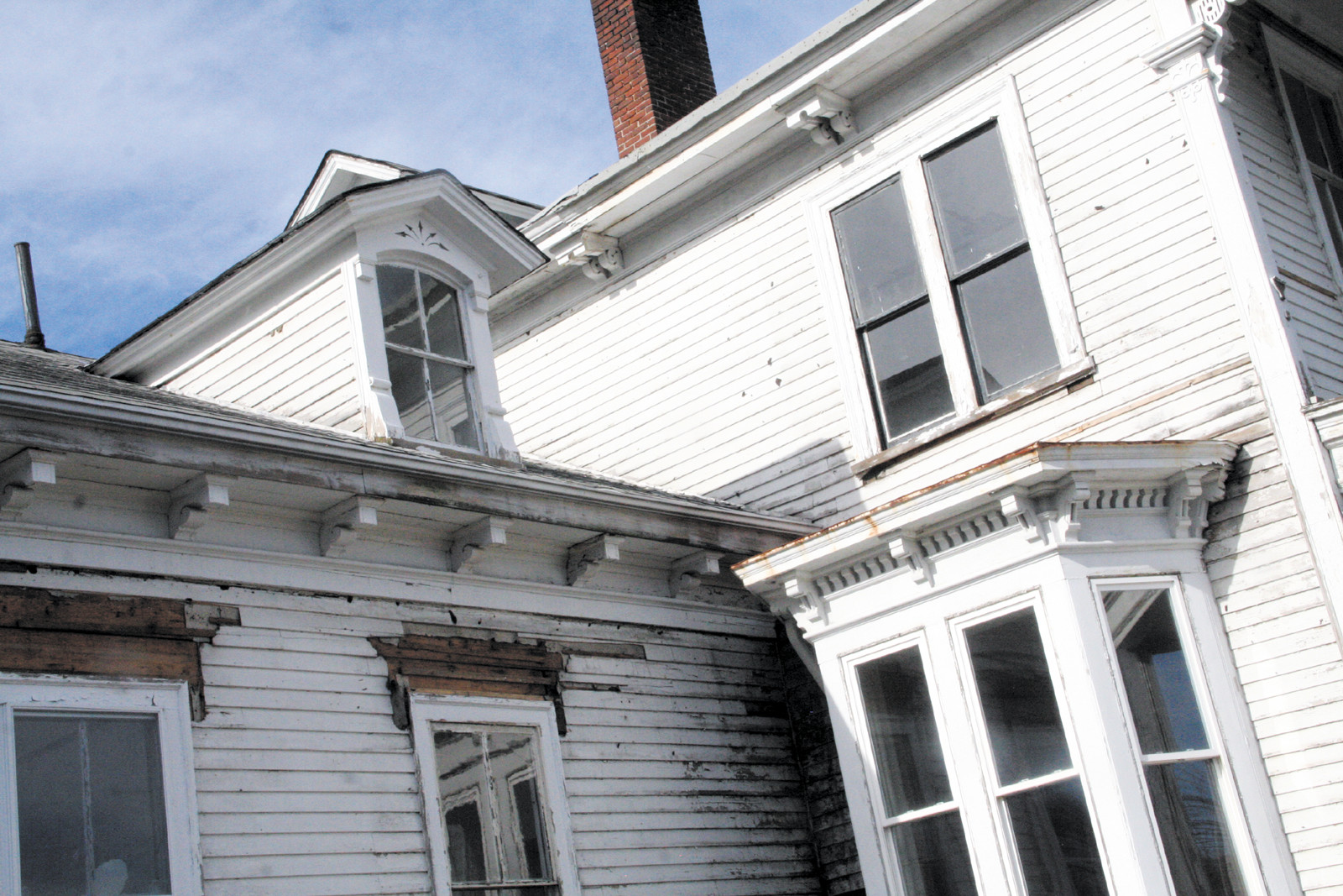 IT ALL GETS SAVED: Decorative trim, chimneys and even copper roofs will all be preserved as part of the restoration work being done to the Fair Street house.