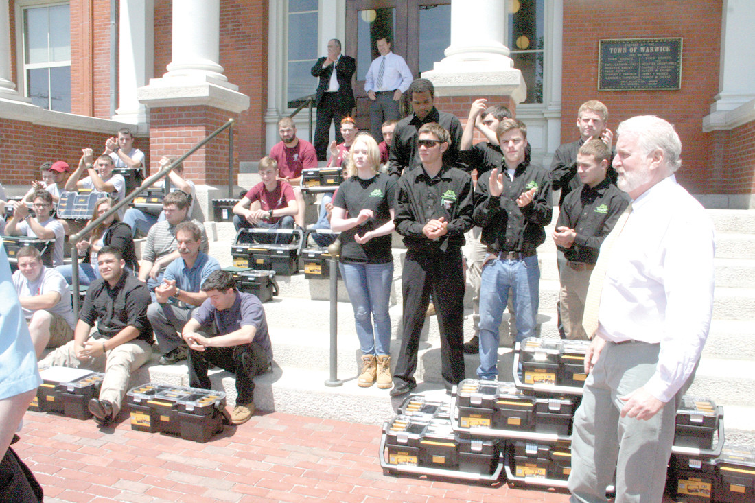 A CAREER STEP: Warwick area Career and Technical Center students (wearing black) join other construction trades students on the steps of City Hall for a group photo.