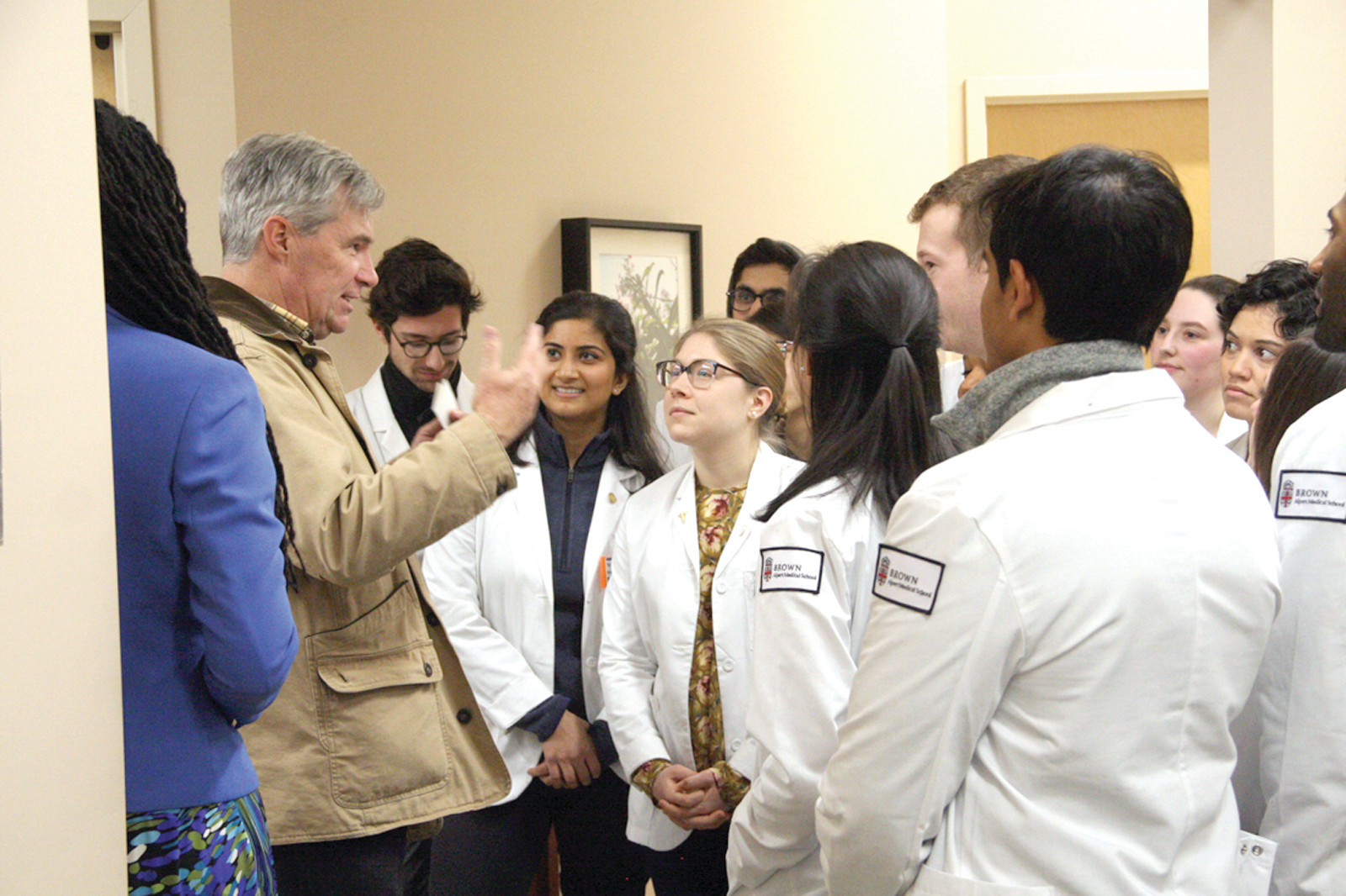 POLITICS AND MEDICINE: Senator Sheldon Whitehouse took a moment following Sunday’s rally to talk with Brown University medical students.