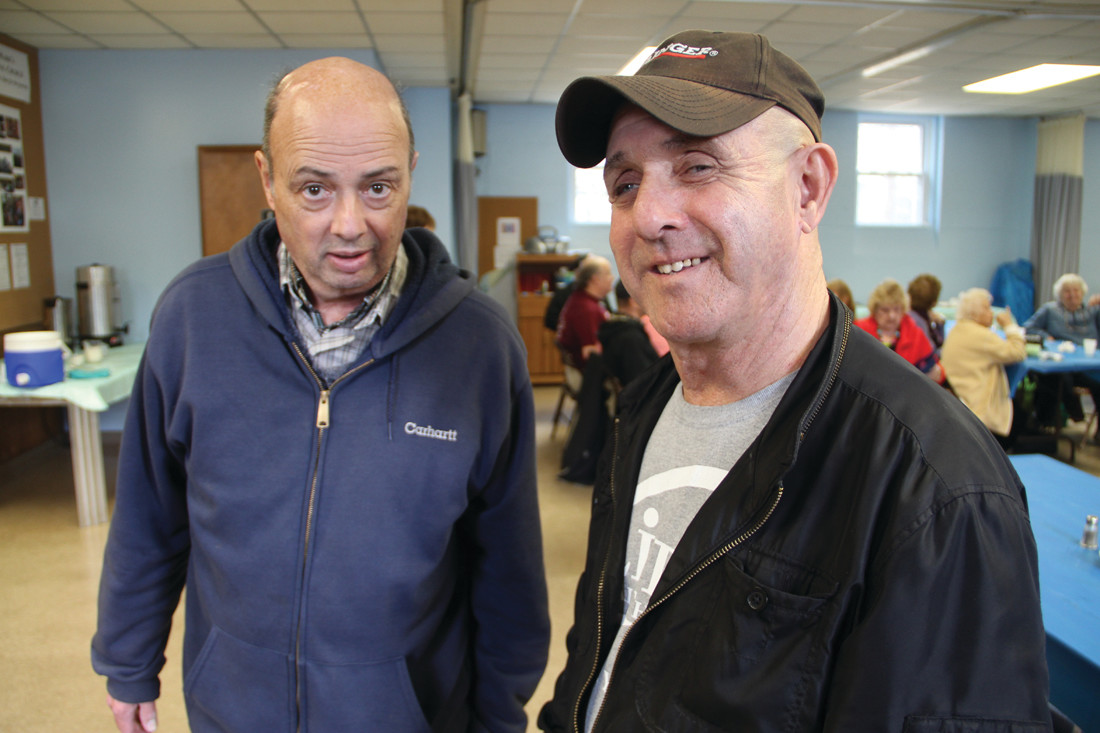 KEEPING A WATCHFUL EYE: Jim Murphy (right) likes bringing his friend Bill Catri to the lunch.