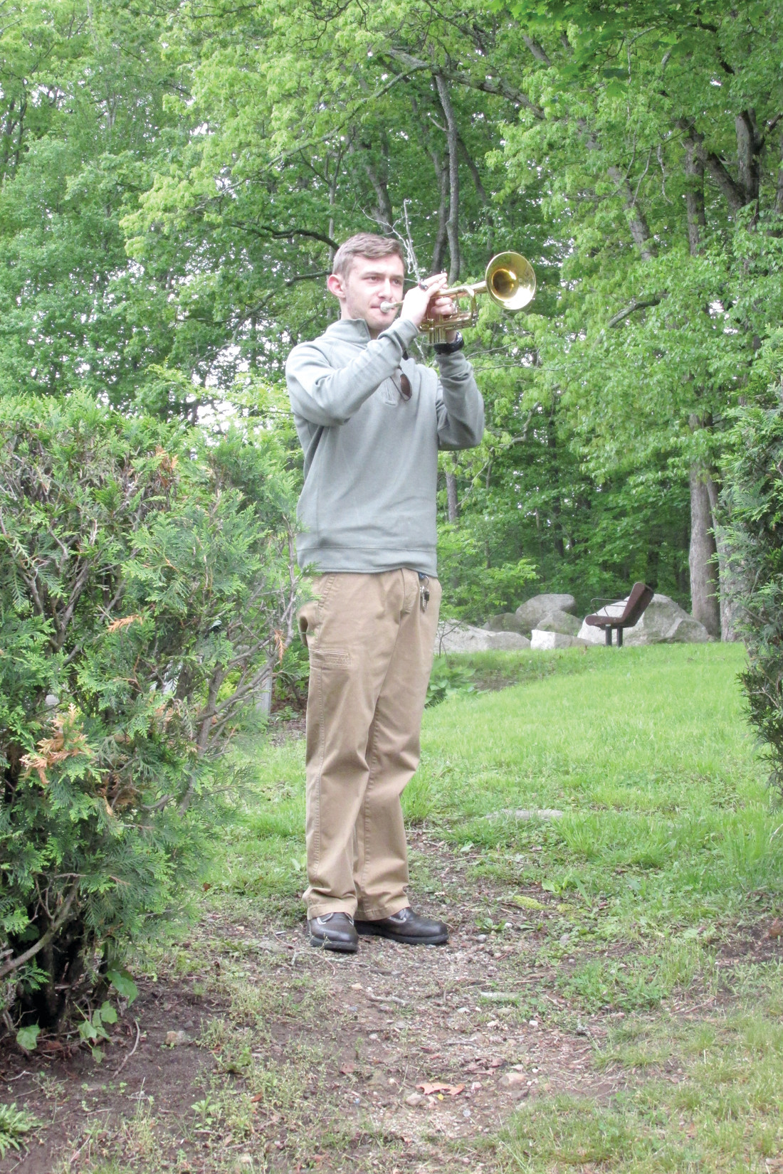PROUD PANTHER: Edward DiLorenzo, a member of Johnston High School’s award-winning band, had the honor of playing Taps through his trumpet that officially closed Saturday’s annual Memorial Weekend Service.