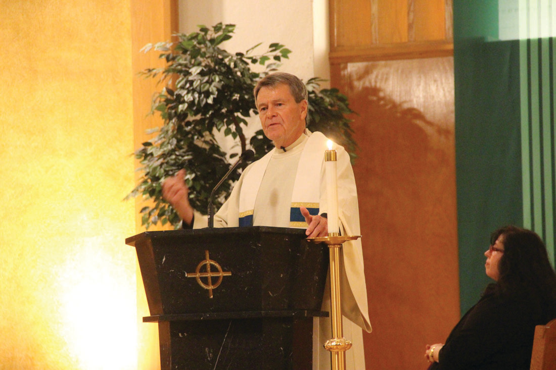 VIGIL CELEBRANT: Father David Ricard addressed the hundreds who gathered for Friday’s vigil.