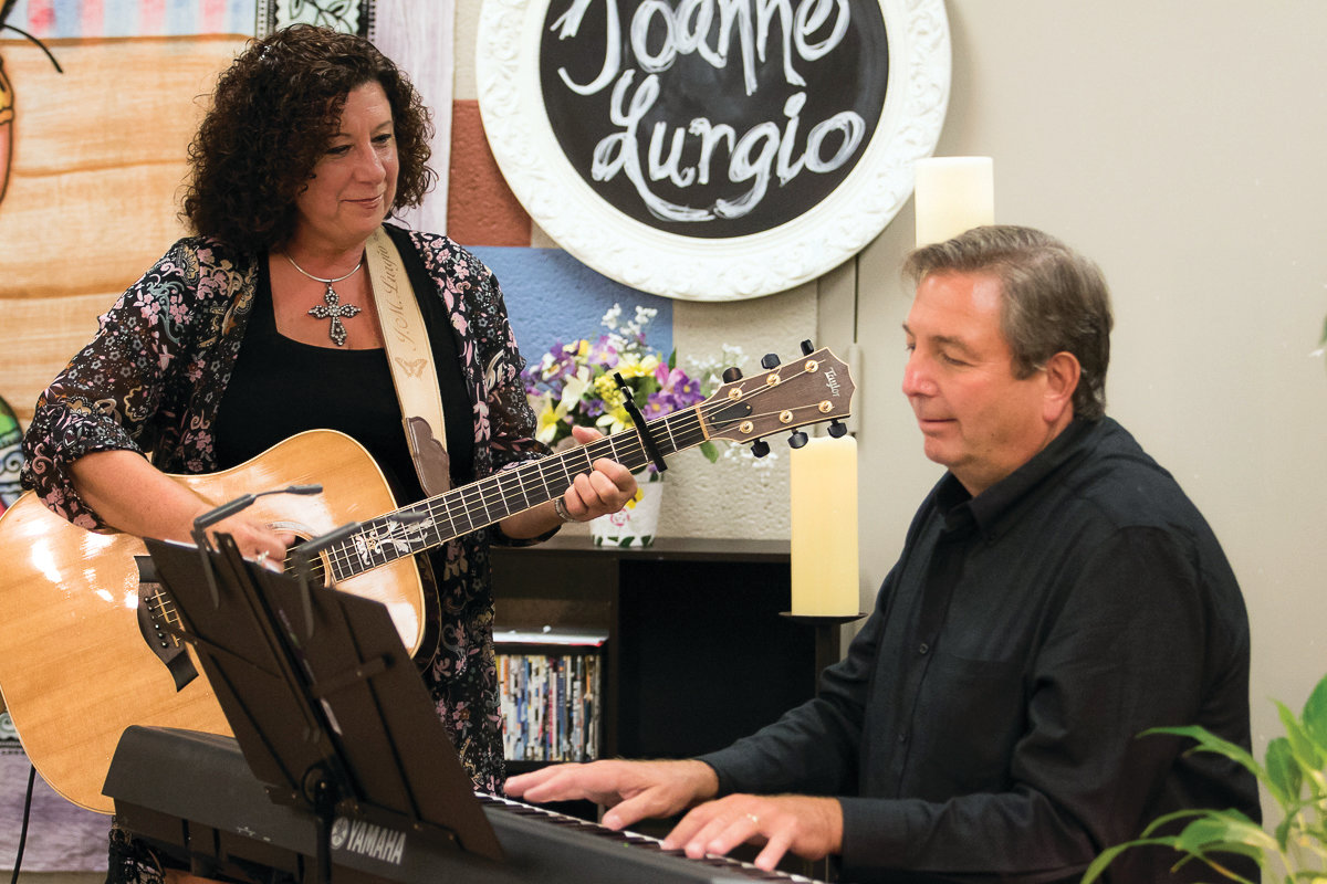 MAKING MUSIC: Joanne Lurgio rehearses with Bryan Barrette, music director at St. Kevin’s Church and her accompanist on “Crossing Jordan.”