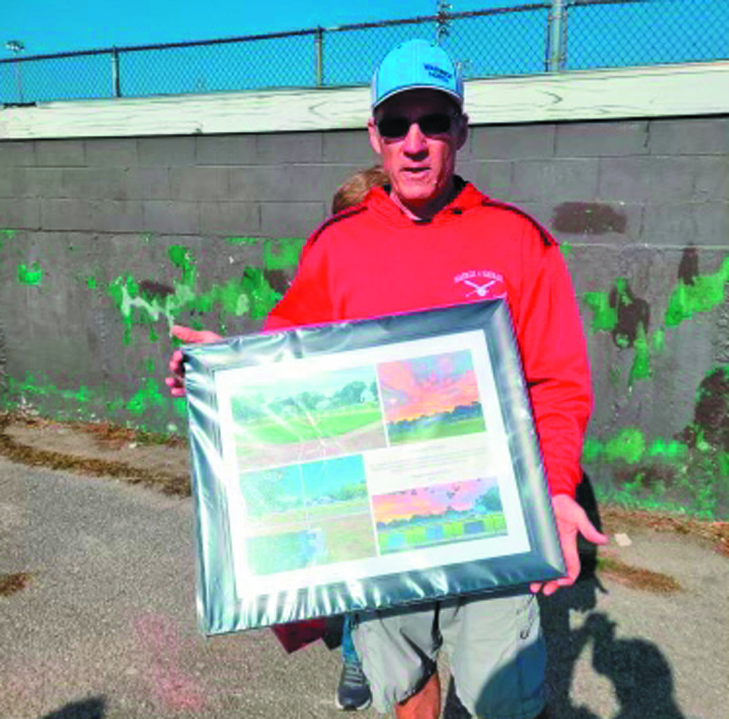 RETIREMENT: After over 30 years of volunteering,
Tom Doyle Sr. recently retired from Warwick North Little League. Doyle served a variety of roles during his time with the league, including being the vice president for a decade as well as many more years as a coach and jack of all trades. The league presented him with a frame with different memories of his time as a retirement gift during the fall ball season.