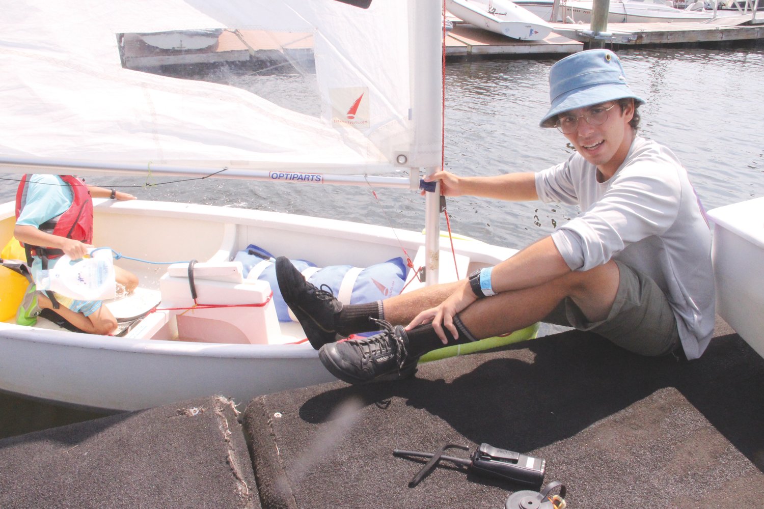 BACK TO TEACH: Eli Reville, a student at Columbia University, who sailed with the Edgewood Yacht Club is now teaching sailing at the club.