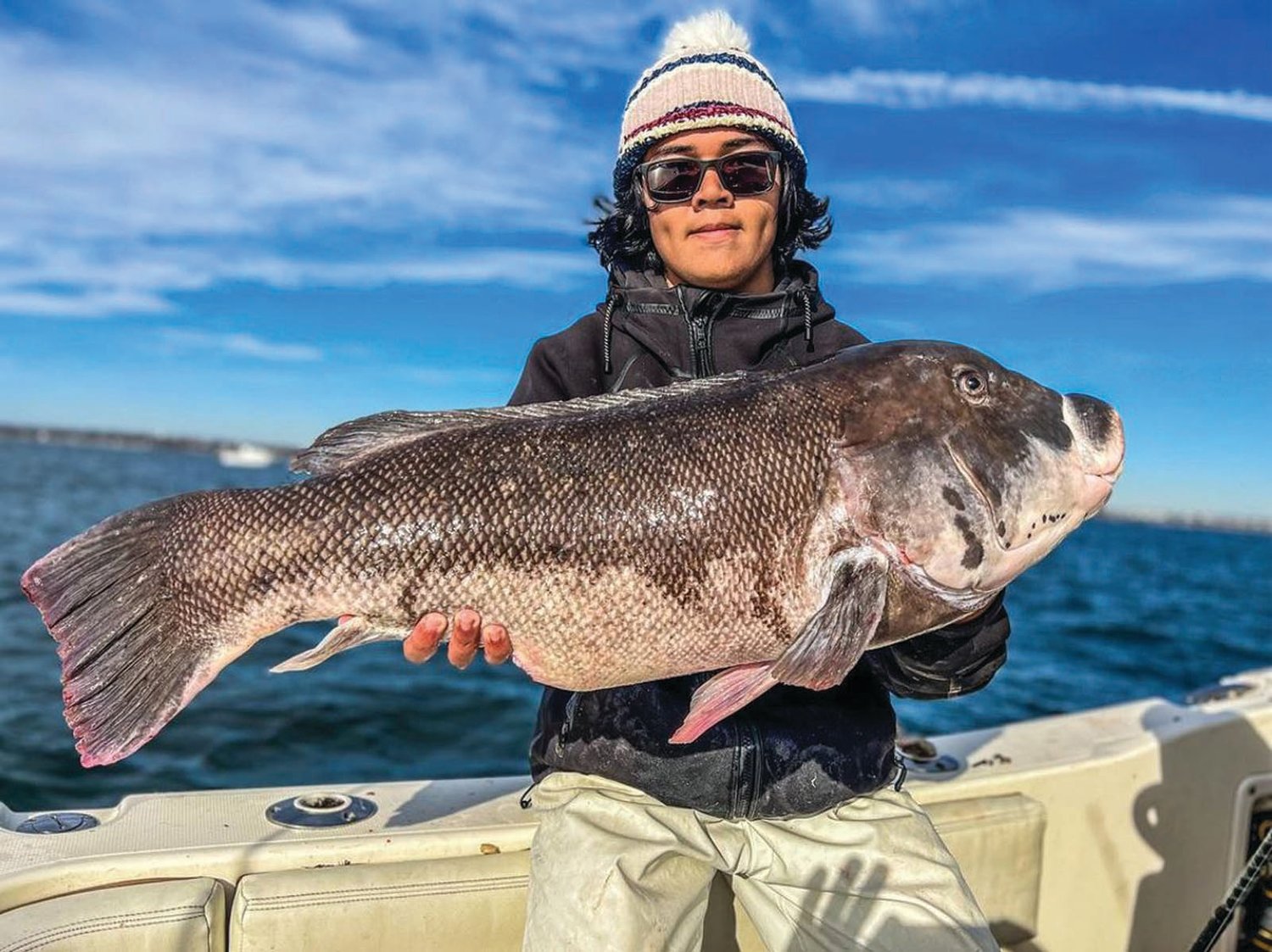 Paul Newman record tautog – Photo D NEW RECORD: Paul Newman of New Jersey caught this RI record tautog, 21.57 pounds when fishing with Tall Tailz Charters off Newport last week.