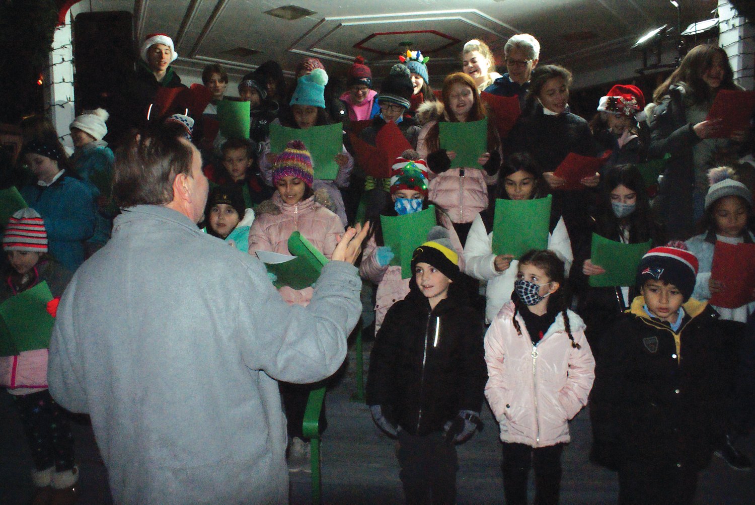 SONGS OF THE SEASON: Singing songs of the season
during the 7th annual Knightsville Gazebo Christmas tree
lighting were members of the Bain Middle School Chorus, under
the direction of Mr. Perry.