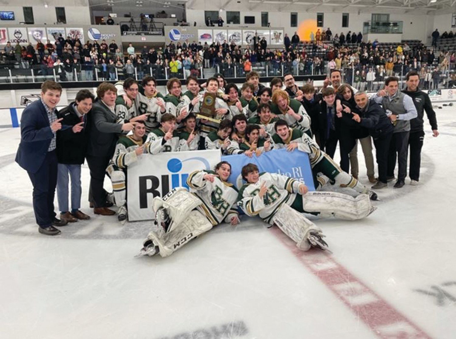 CHAMPS AGAIN: The Hendricken hockey team after winning the state championship. (Photos by Alex Sponseller)