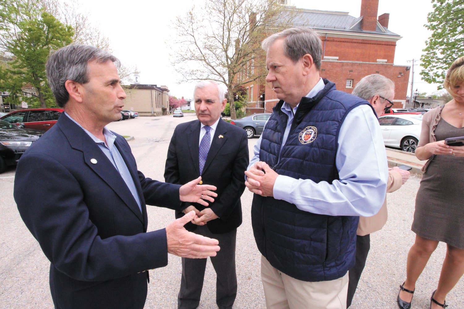SHARING THE VISION: Mayor Frank Picozzi talks with Senator Jack Reed and Ward 1 Councilman William Foley at Friday’s announcement that the city is receiving a $5 million earmark grant for the development of Warwick Plaza including an outdoor skating rink. (Warwick Beacon photos)