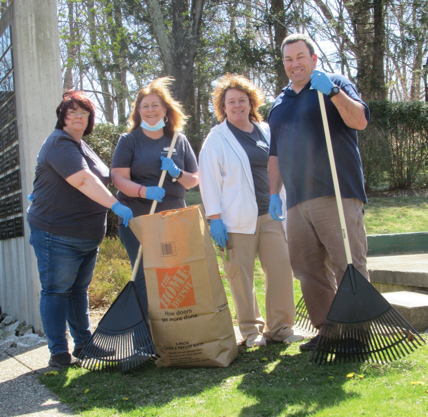 EARTH DAY: Deanna Lavendier, Rick Bigelli, Maryann Grace and Rhonda Simmons helped clean up Johnston for Earth Day.