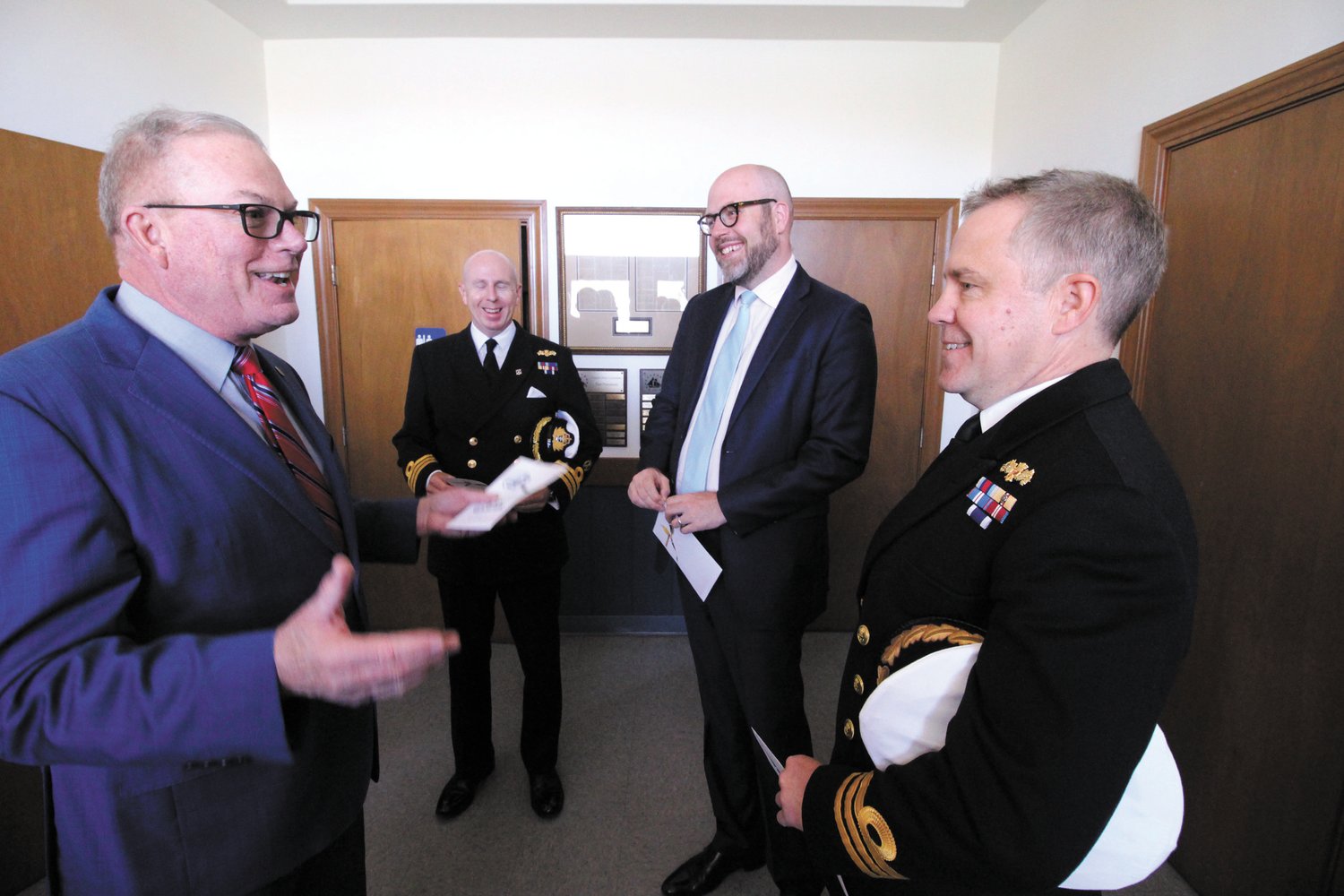 THE REDCOATS HAVE ARRIVED: Rhode Island state Rep. Joseph M. McNamara chats with British Naval Commander Steven White, Great Britain’s Consul General for New England Dr. Peter Abbott OBE, and Commander Simon Rogers, of Her Majesty’s Royal Navy.