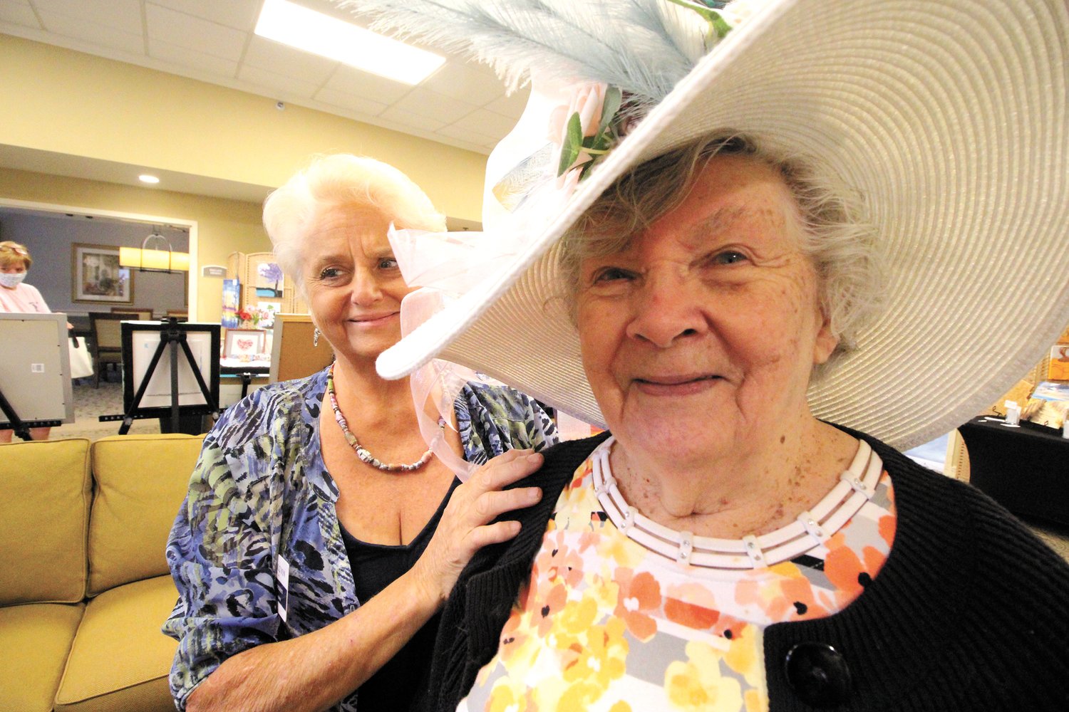 CAT IN THE HAT: Marilyn Kasparian showed off one of the hats she decorated. Will she wear it for the Running of the Roses, or is it just to bring a smile to the tenants at Halcyon Senior Living? Either way, it’s fun.