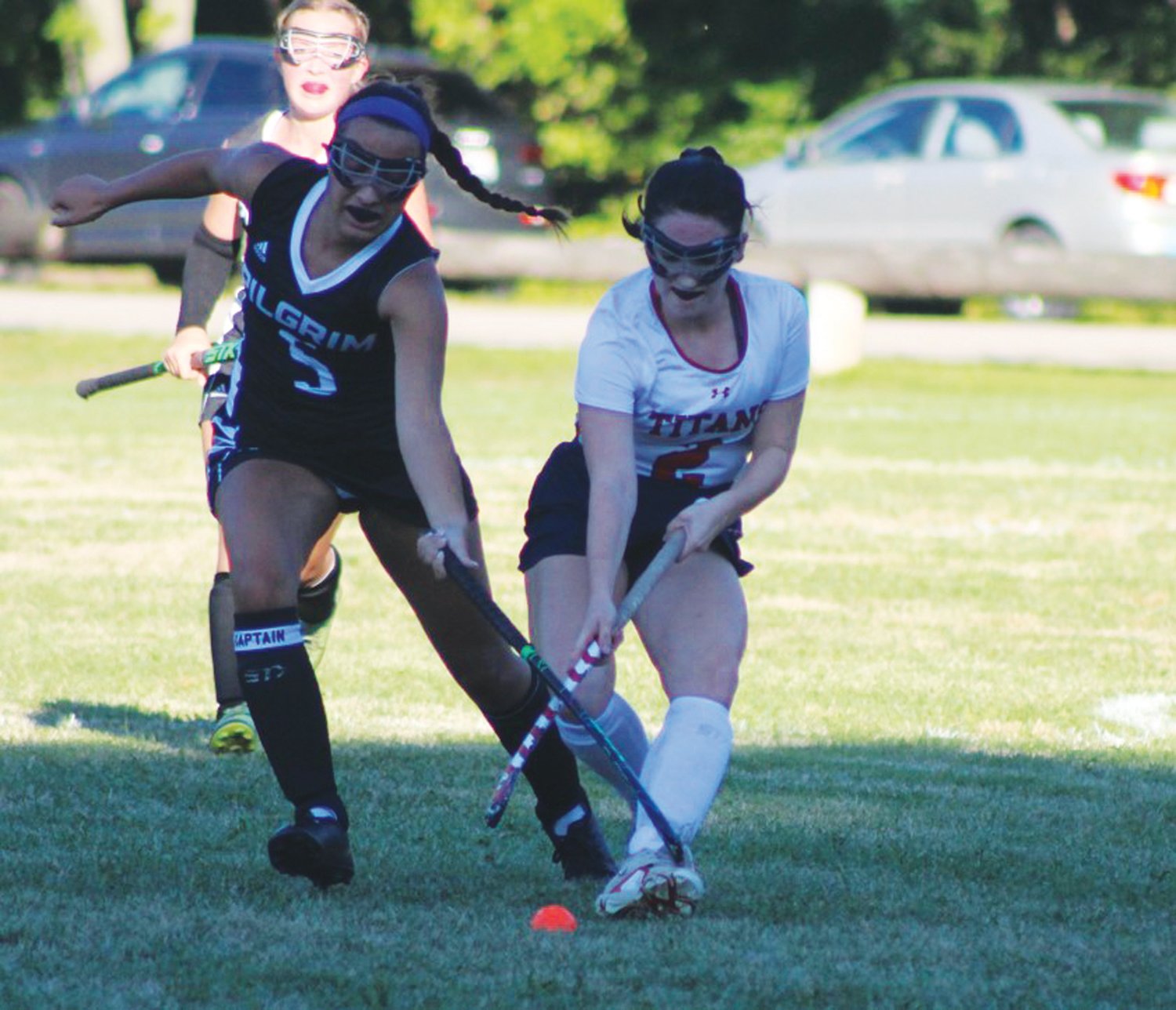 TRACKING IT DOWN: PIlgrim’s Mary Centracchio and Toll Gate’s Coco Collette track down the ball last week.