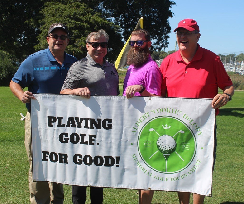 SUPER SPONSOR: Dave Knight (second left) who along with his brother Frank own and operate Knight Heating & Plumbing, is joined by his playing mates Mike DeLory, Mark Phillips and Robert Lawless prior to teeing off in the recent Cookie DeLory Memorial Golf Tournament. (Beacon photos Alex Sponseller)