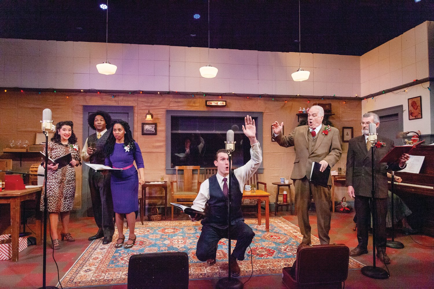 (L to R) Helena Tafuri as Violet Bick, Rodney Witherspoon II as Harry Bailey, Lynsey Ford as Mary Hatch, Jeff Church as George Bailey, Fred Sullivan, Jr. as Henry F. Potter, Richard Noble as Billy Bailey