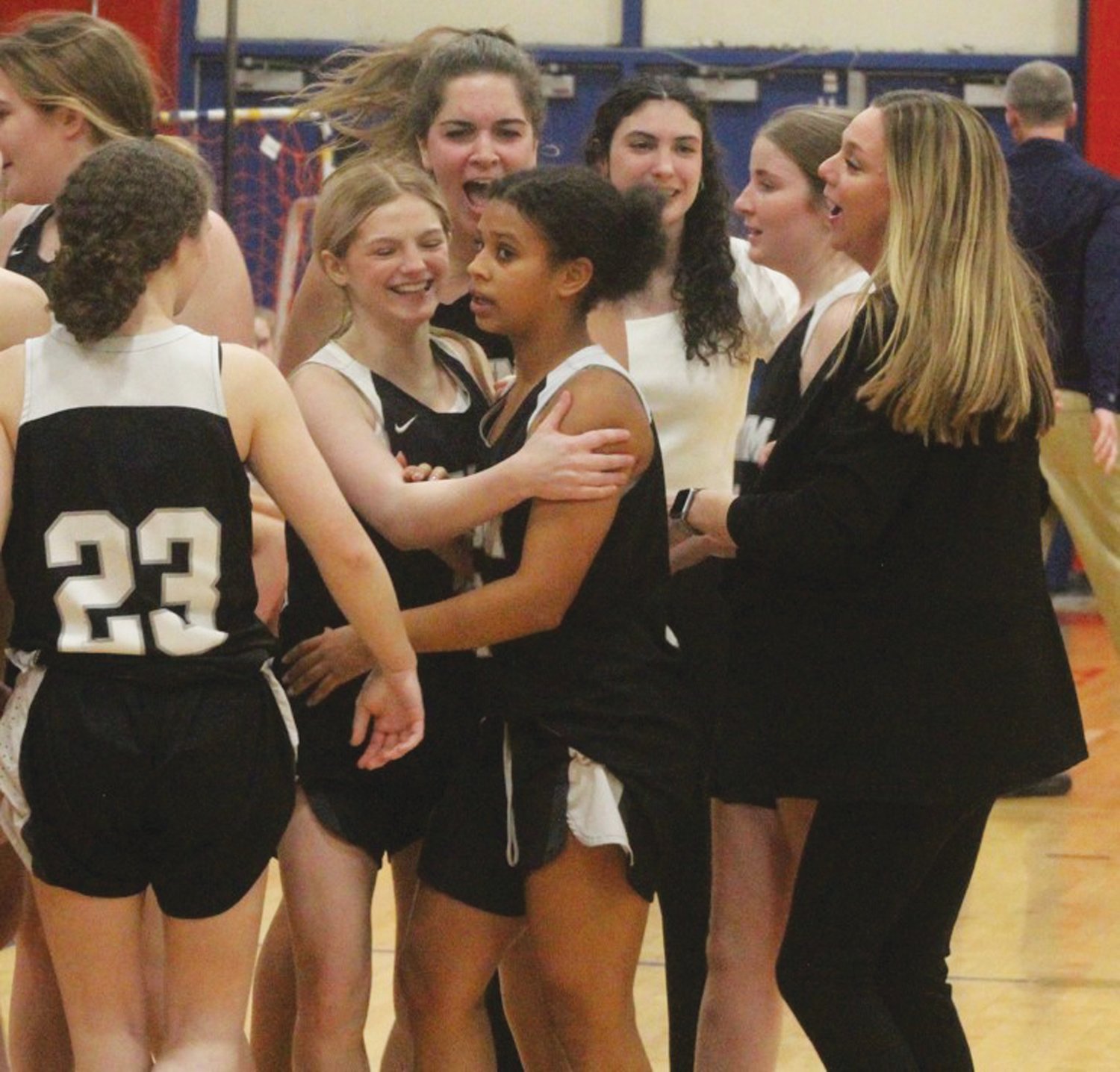 TAKING FIRST: Members of the Pilgrim girls basketball team celebrate after beating Toll Gate on Tuesday. (Photos by Alex Sponseller)