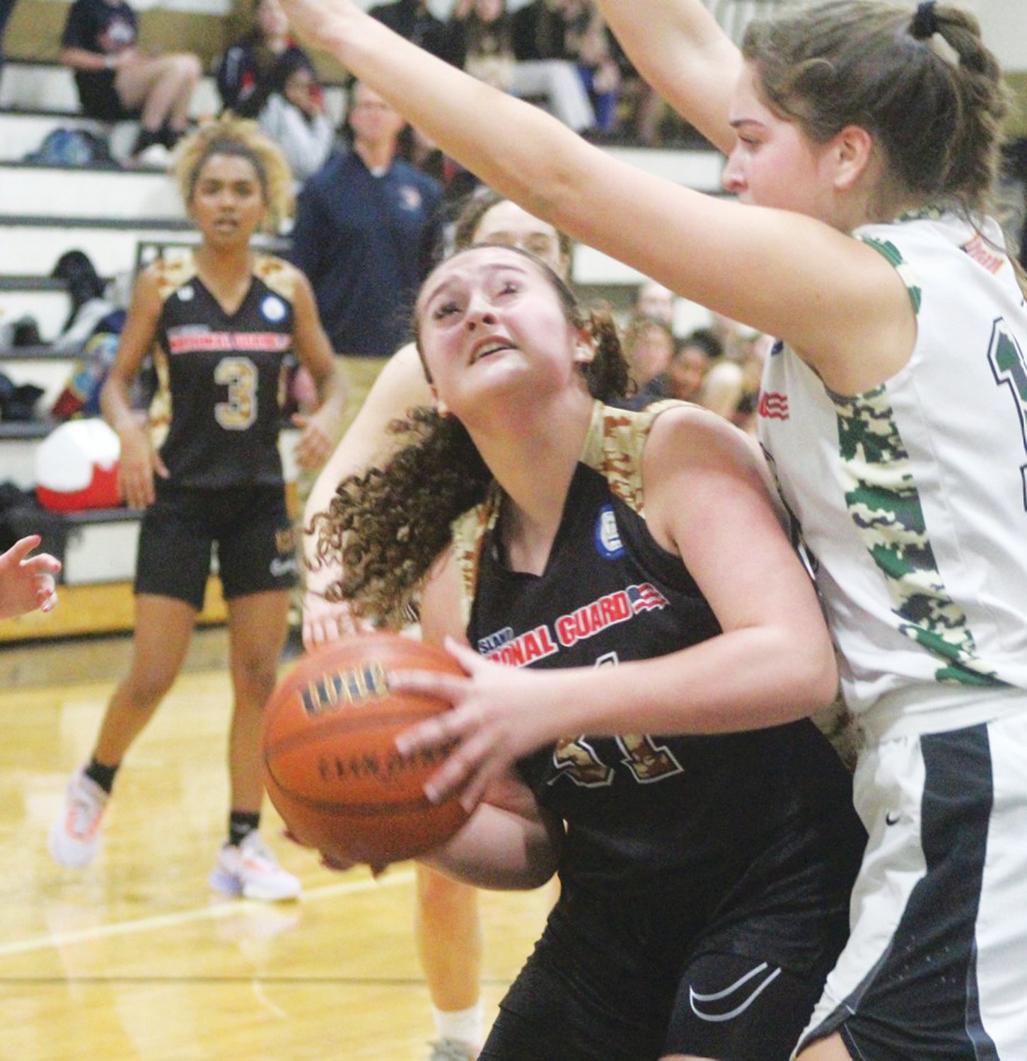 IN THE PAINT: Toll Gate’s Lola Olink works against Pilgrim’s Gianna Ramos.