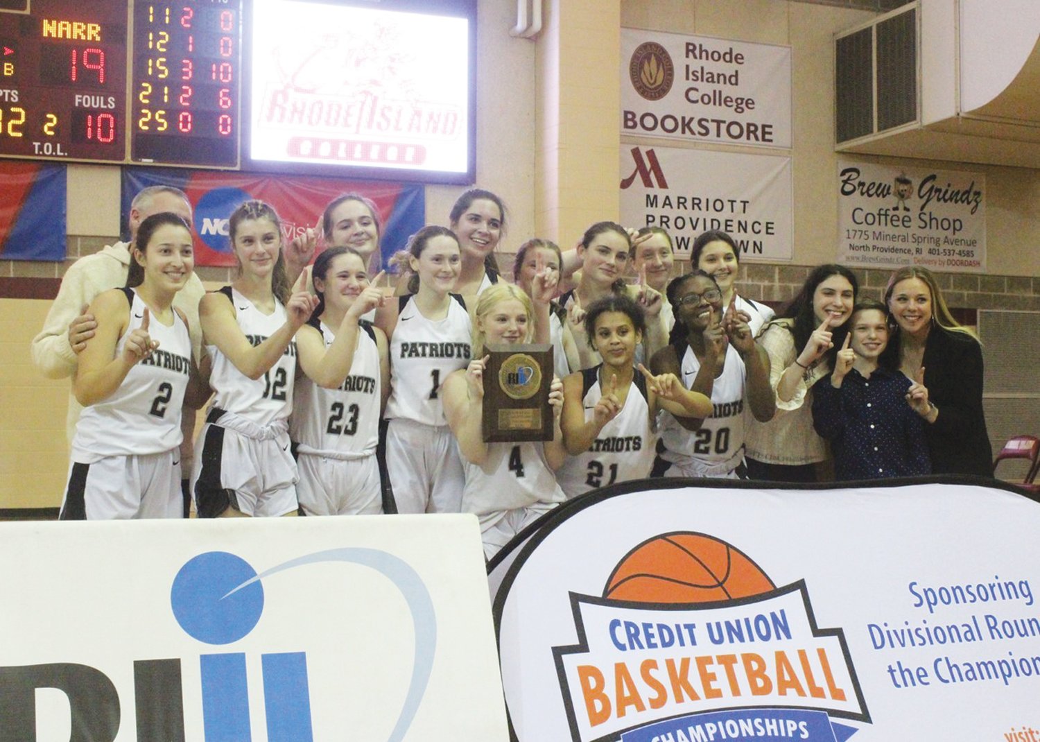 CHAMPS: The Pilgrim girls basketball team after winning the Division III Championship. (Photos by Alex Sponseller)
