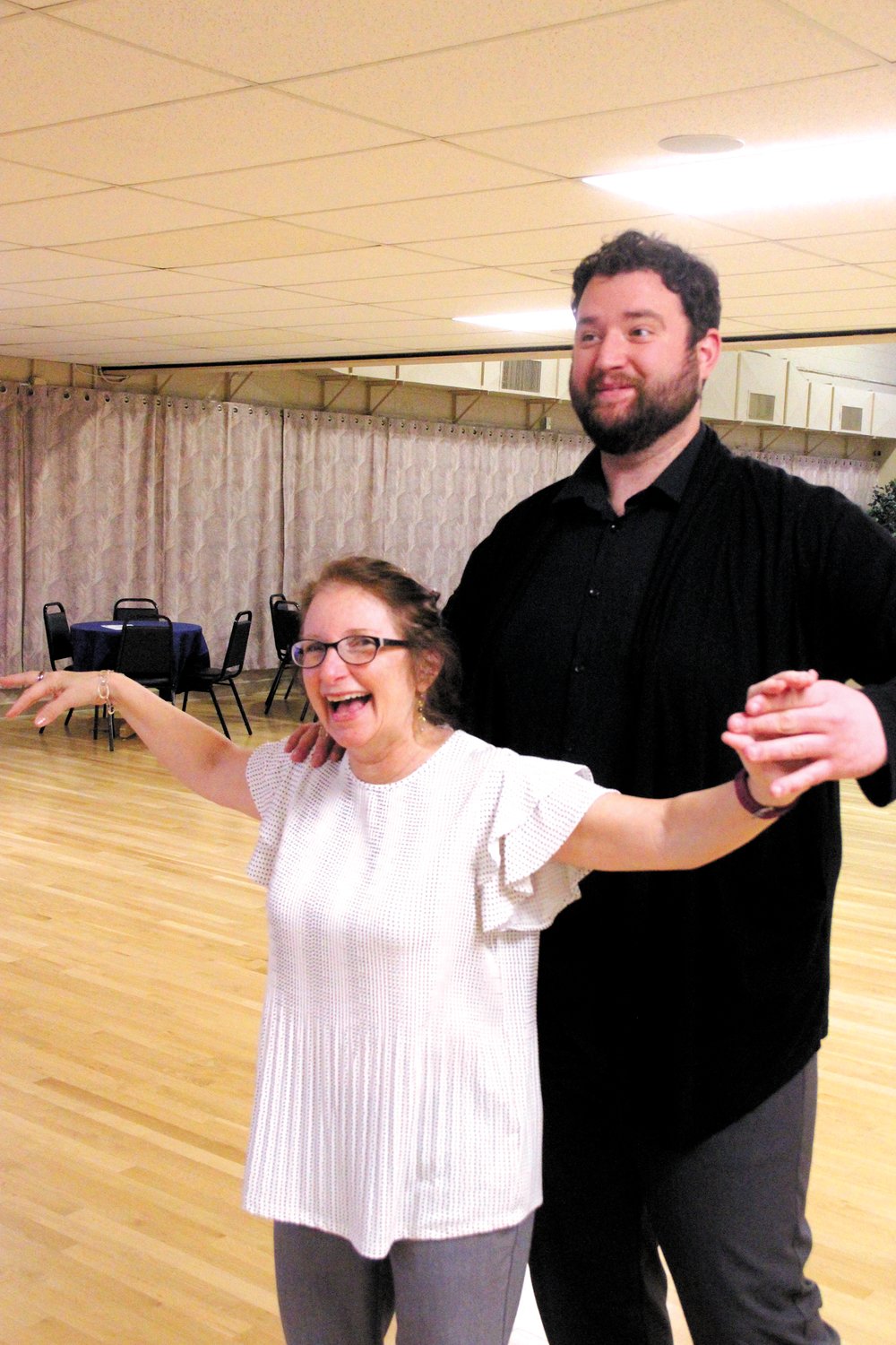SILENT STEPS:  Terri Brophy and Noah Carsten step through their routine during one of the weekly sessions at Dancing Feeling. The couple rehearses without music, which they said is playing in their minds as they cover the floor. (Warwick Beacon photos)