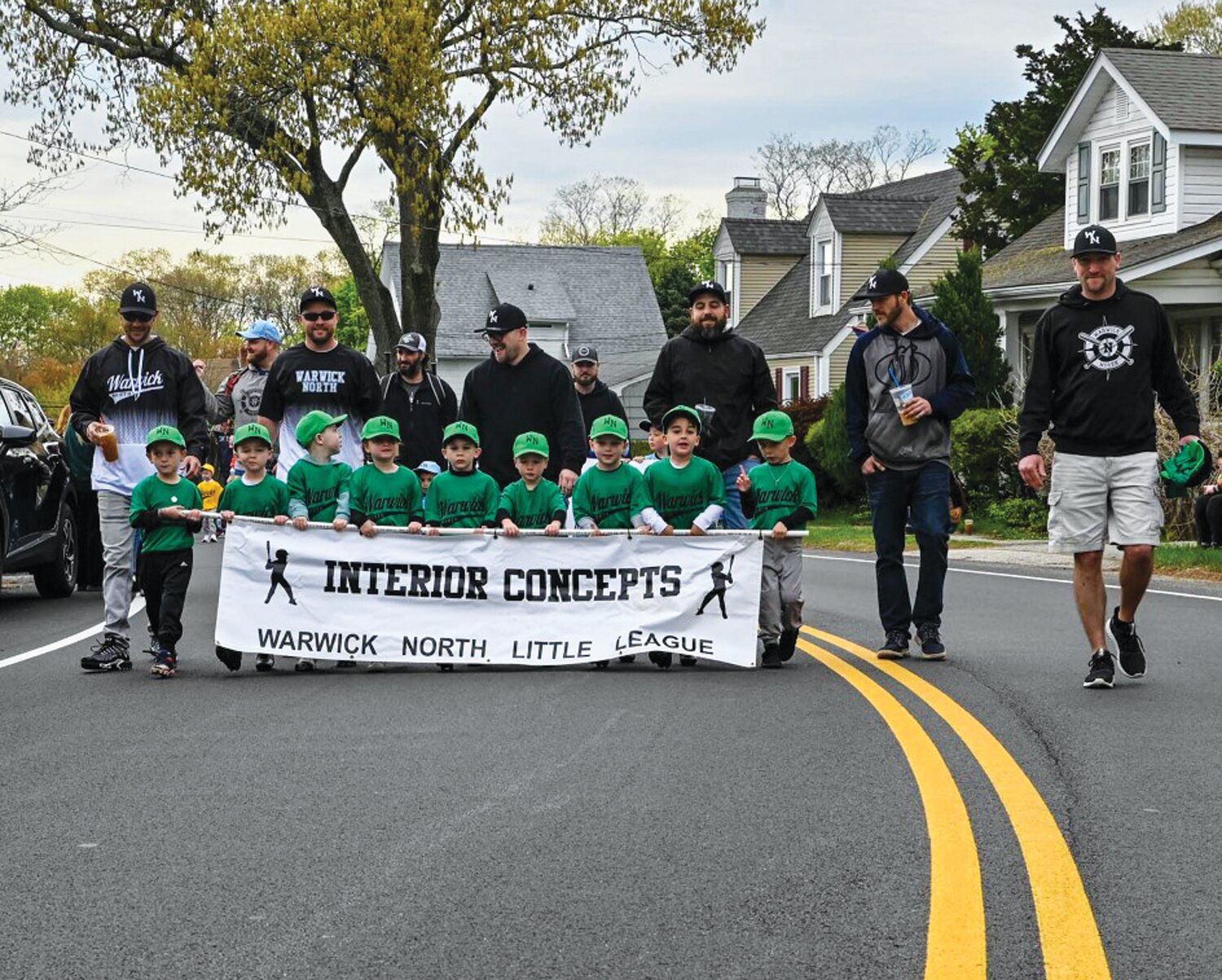 MARCHING TO THE FIELD: Many Little Leaguers took park in Warwick North’s Opening Day parade which took place prior to first pitch down at the pit on Post Road.