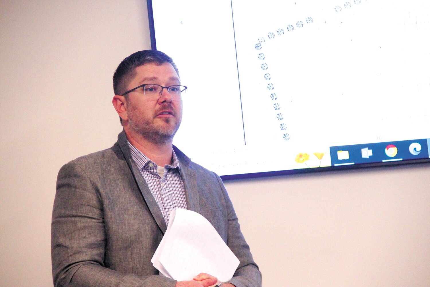 SPELLING OUT THE DETAILS: Brad Parsons, director of design and permitting for Verogy that proposes to build a solar farm on Knight Street made the Planning Board presentation. (Warwick Beacon photos)