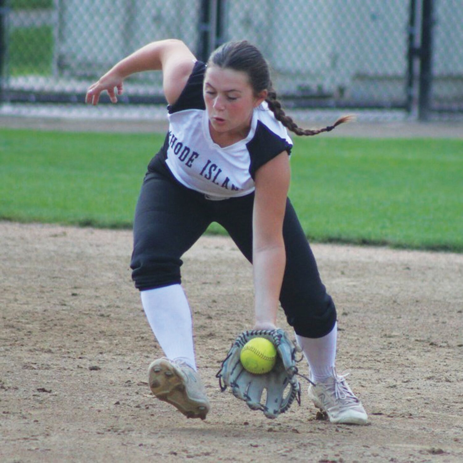 SHORTSTOP: Emma Manzo makes a play in the field at regionals for Warwick North.