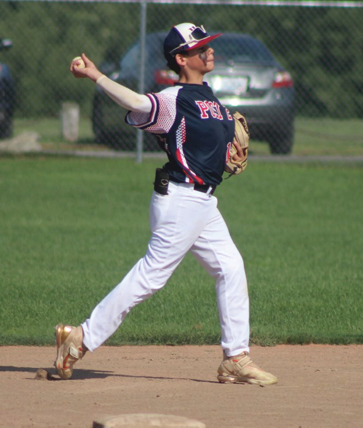 ON THE DIAMOND: Second baseman John Brown makes a play in the field.