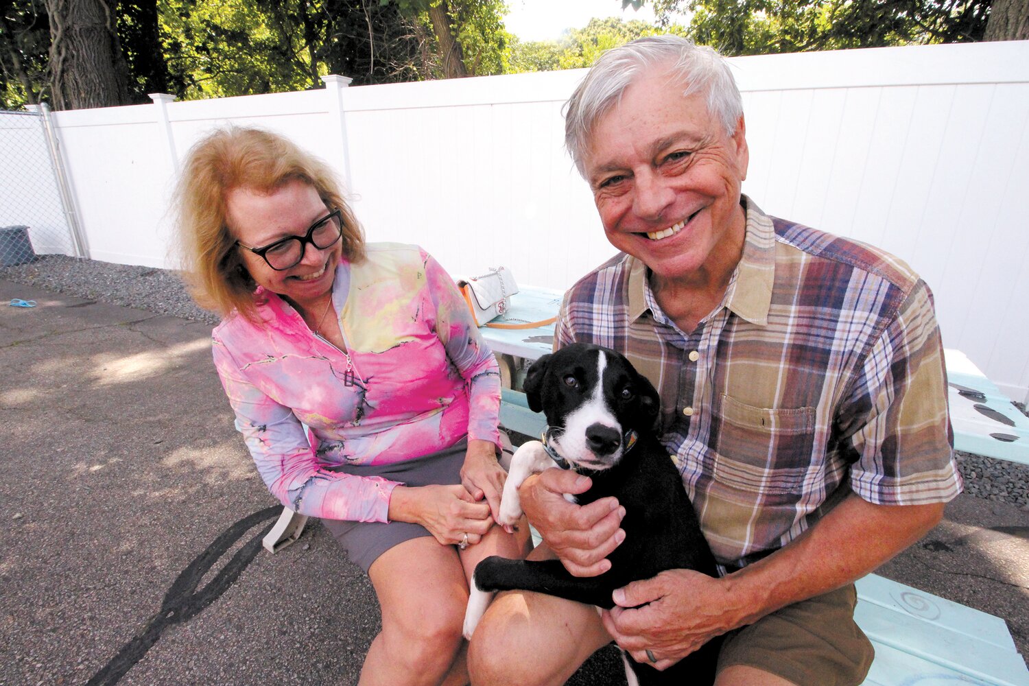 IT COULD BE A MATCH: Rick and Denise Dobras of Buttonwoods were thrilled to be introduced to Hayley last weekend at the EGAPL Center of Rhode Island Rescue in Cranston. Crowded animal shelters and what shelter personnel  face is explored in the This Side Up column on page 5. The Dobras’ are waiting to learn if their offer to adopt Hayley is accepted. (Warwick Beacon photo)