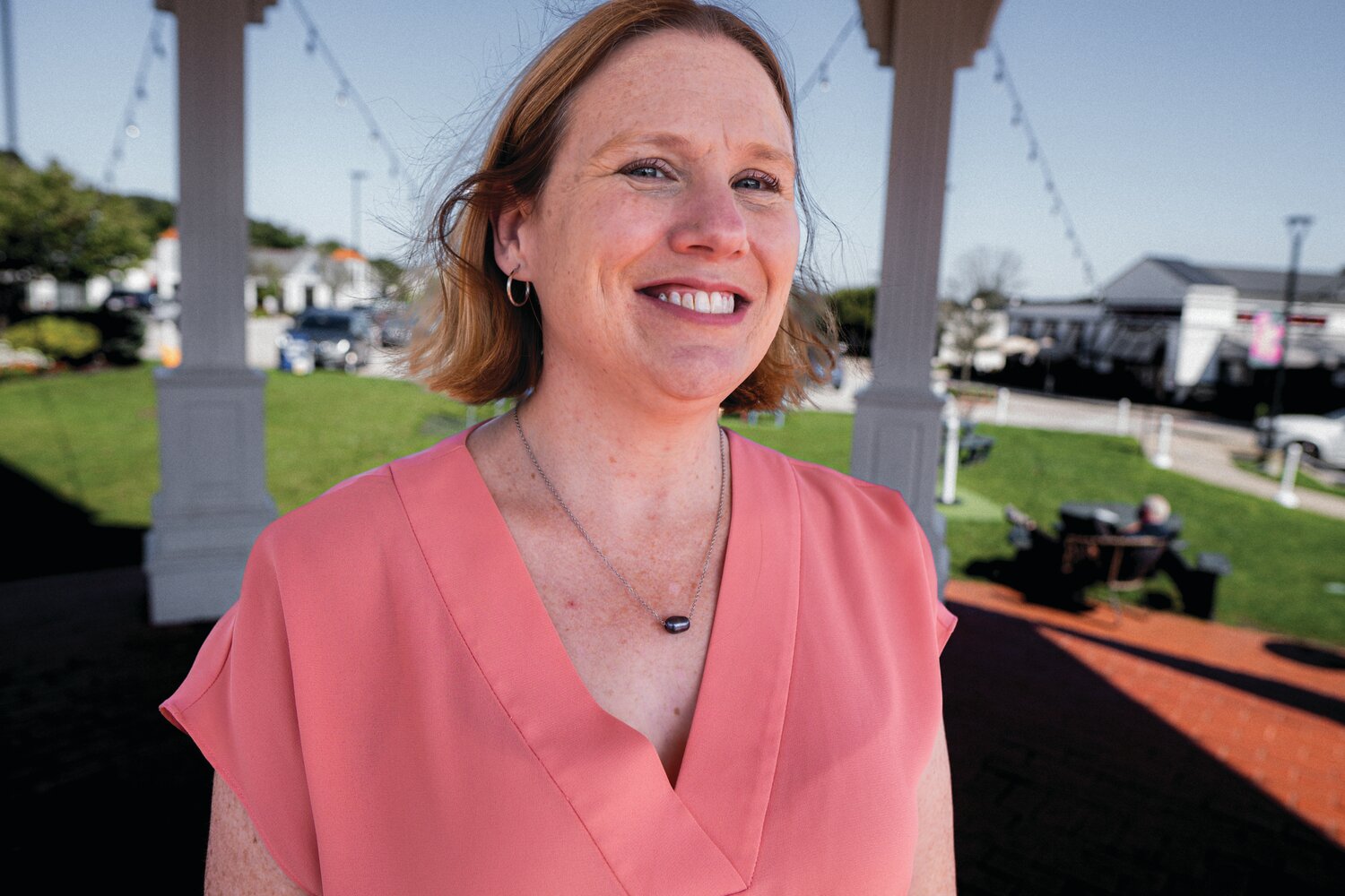 Rachel McNally: A full-time realtor, part-time educator, current volunteer for the Oaklawn Grange, and mother of three who loves to stay active in her community. (Photo by Tim McFate, courtesy of the OneCranston HEZ)