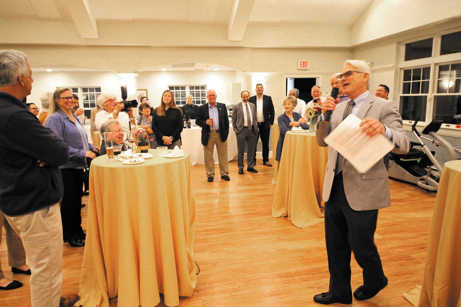LEADING A CELEBRATION: Cornerstone Adult Services chairman of the board Steve Tilley greets …and entertains…those gathered last Thursday to commemorate the organization’s 50th anniversary.