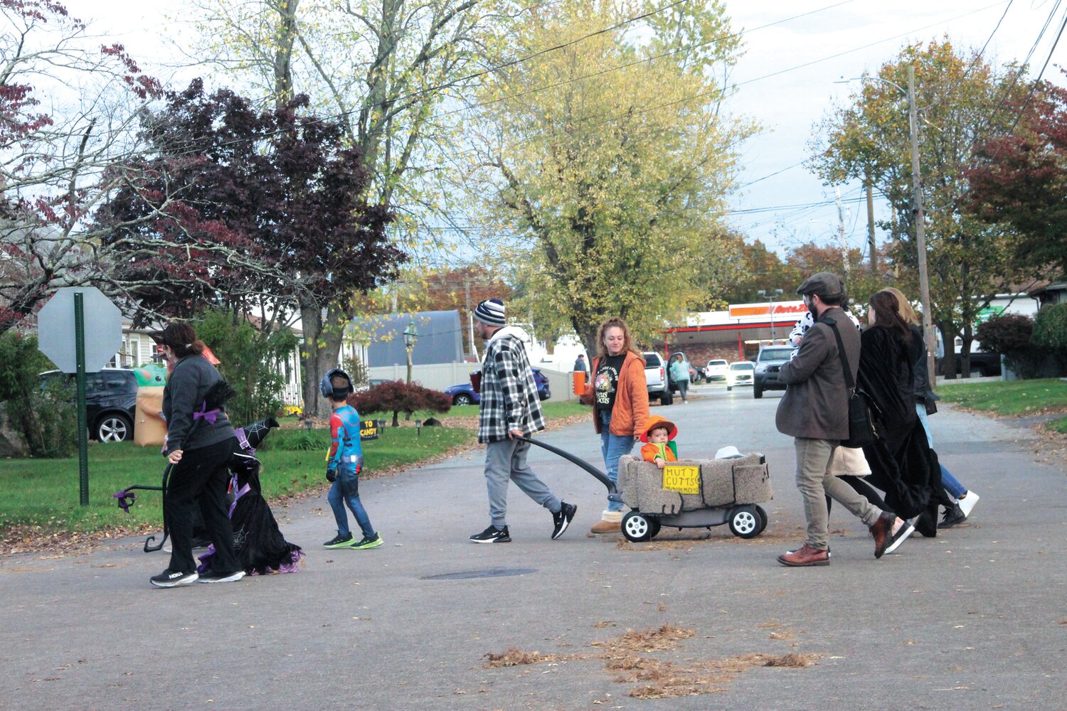 READY TO HAUNT THE NEIGHBORHOOD: Tick or treaters make their way to the start of the Halloween parade.