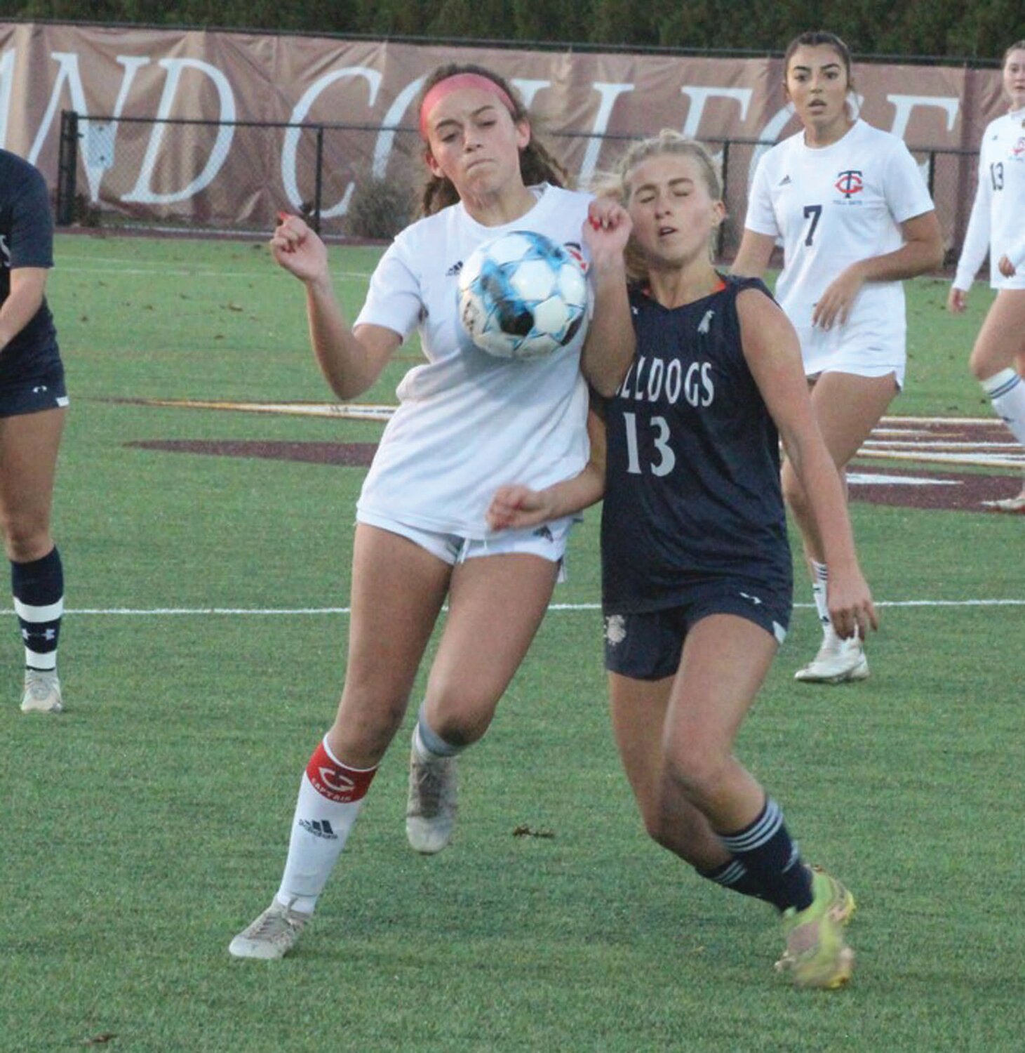 TOUGH DEFENSE: Toll Gate’s Anna Pickering battles for the ball.