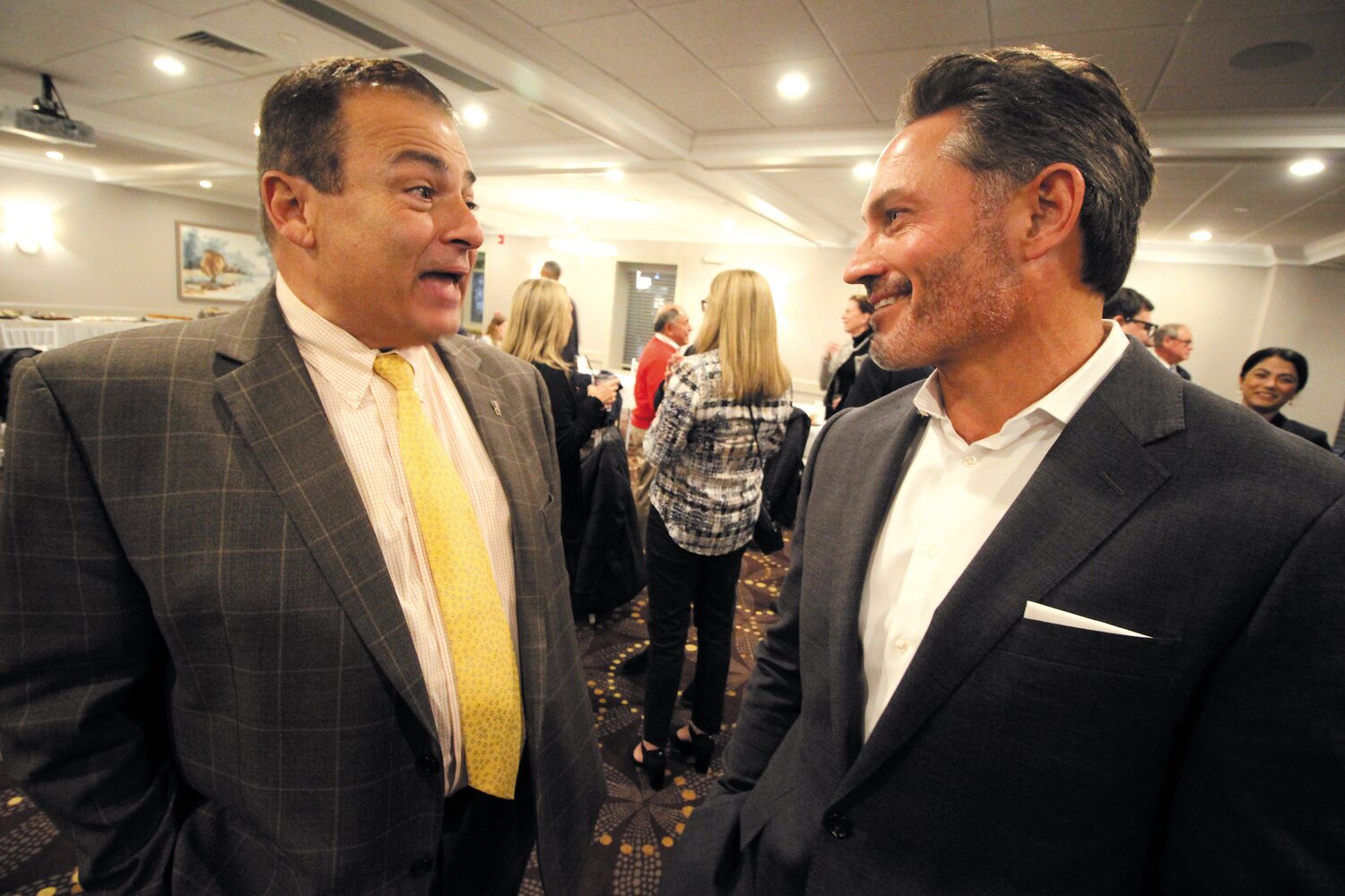OPEN WIDE: More than 70 members of the Rhode Island dental community turned out Tuesday at a fundraiser for House Speaker K. Joseph Shekarchi at Chelo’s in Warwick. Here, Shekarchi, left, talks with association president Dr. Frederick Hartman. The event raised more than $20,000. (Warwick Beacon photo)