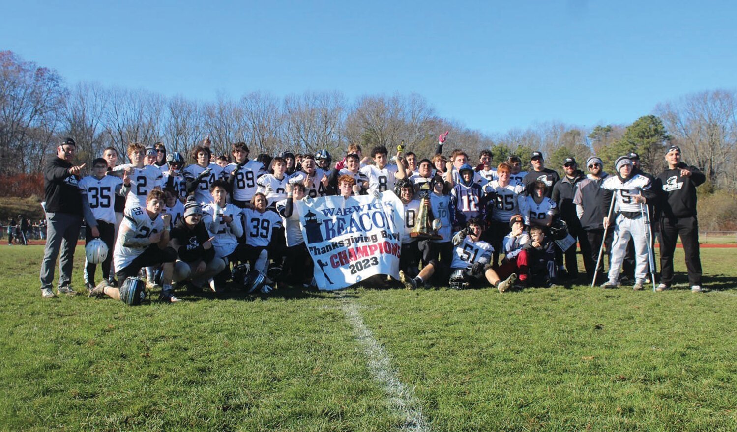 THE BEACON BOWL STAYS: The Pilgrim football team after winning the Thanksgiving Beacon Bowl. (Photos by Alex Sponseller)